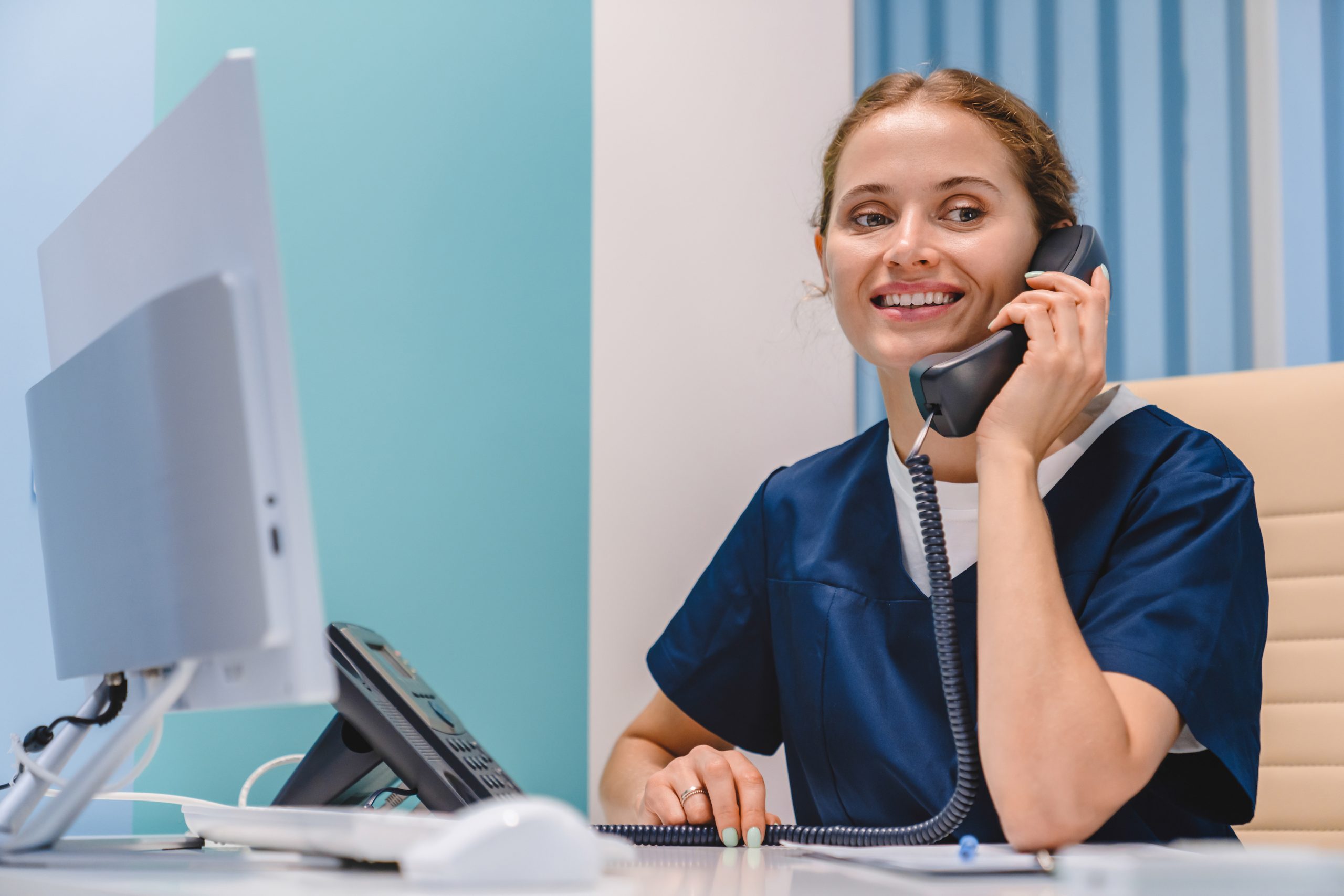 a medical answering service with a woman answering the phone